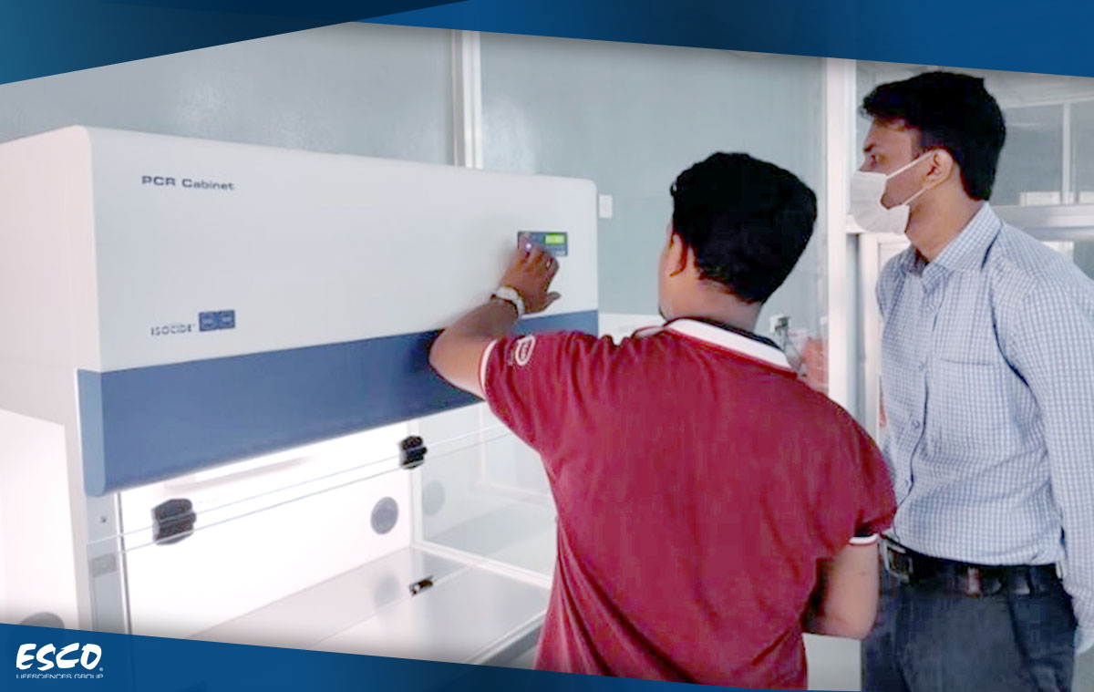 Esco engineer conducting the filter integrity test on a PCR cabinet